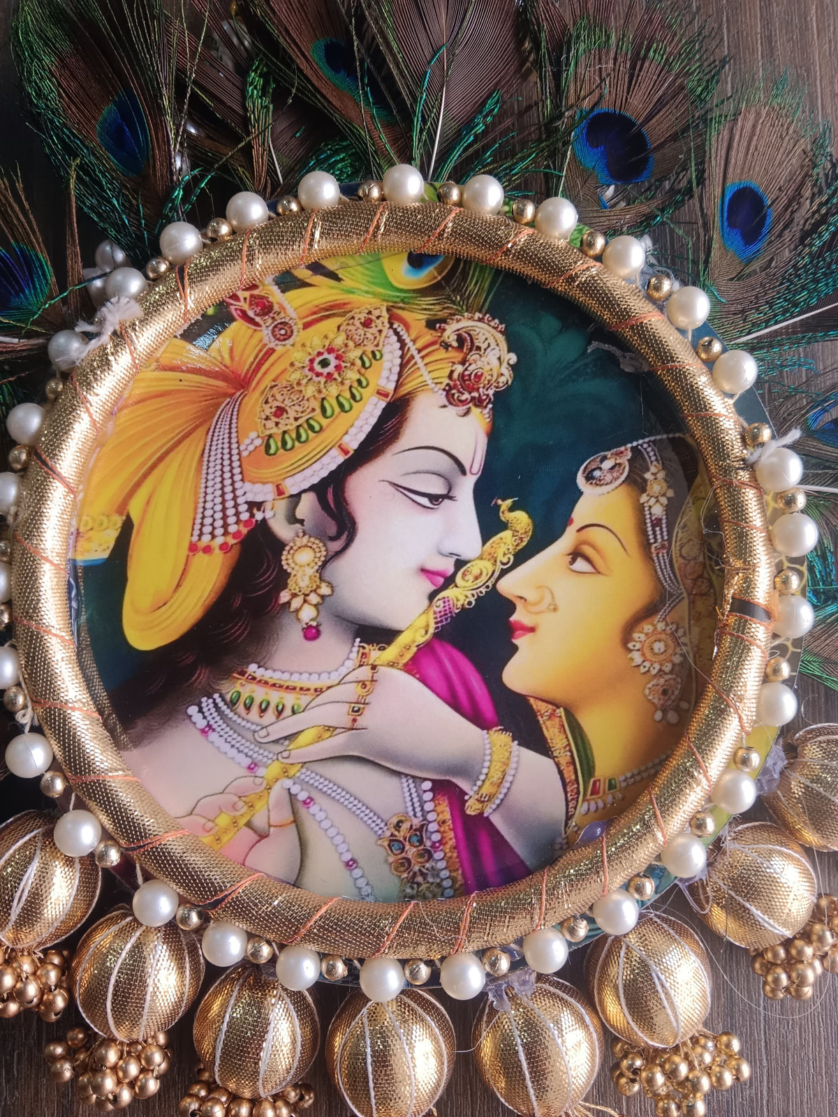 Nutts Radha Krishna Peacock Feather Wall Hanging for Home Décor | Handmade Pearl & Golden Decorative Hanging for Pooja Room, Entrance & Festive Decoration Pack of 1 (SMALL108)